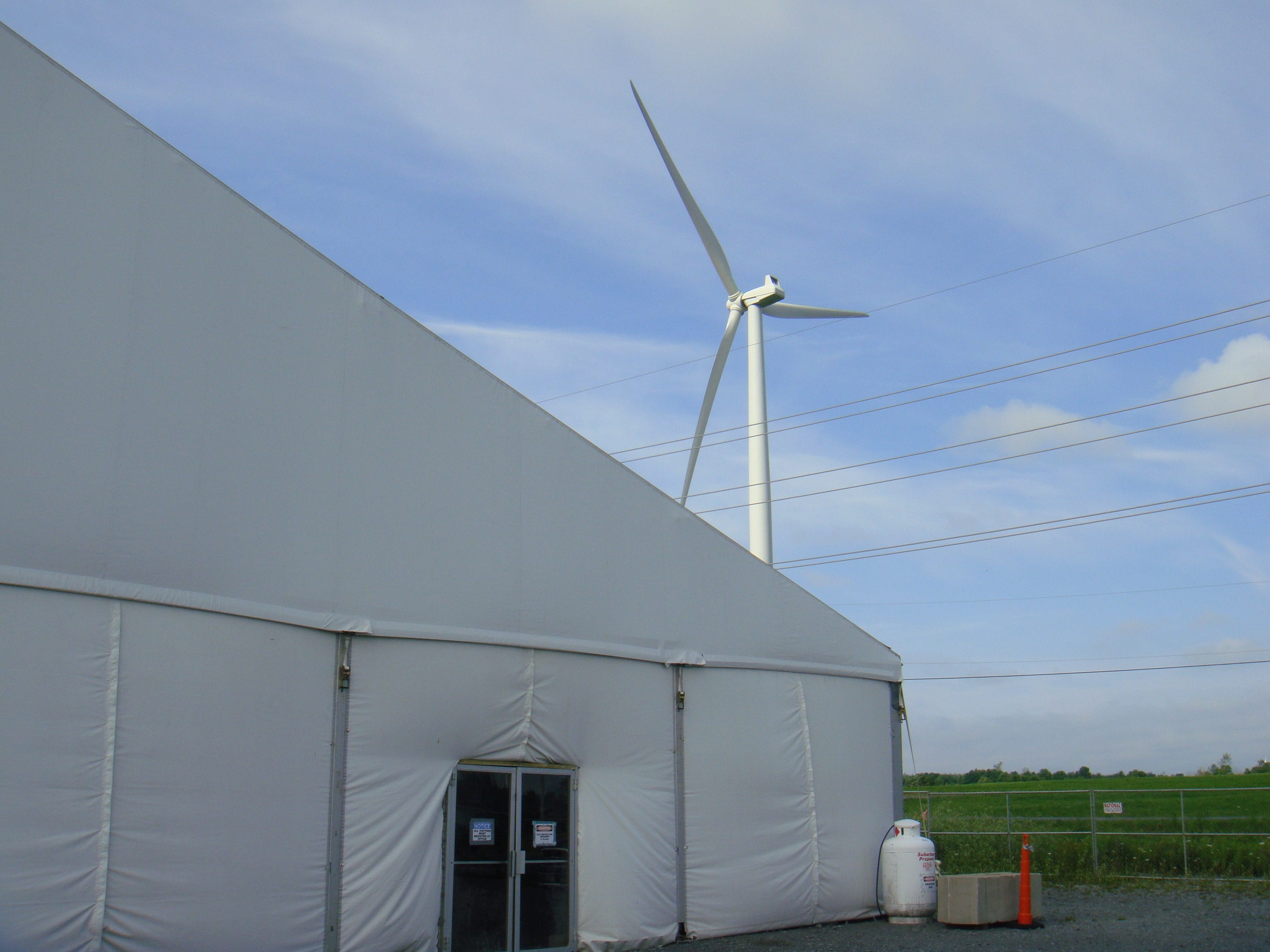 Utilizing a Construction Tent for Summer Construction Projects On Windmill Farm - American Pavilion