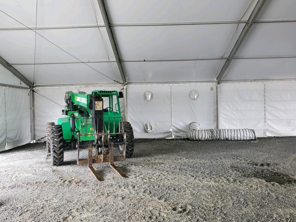Using Machinery in Tent - American Pavilion