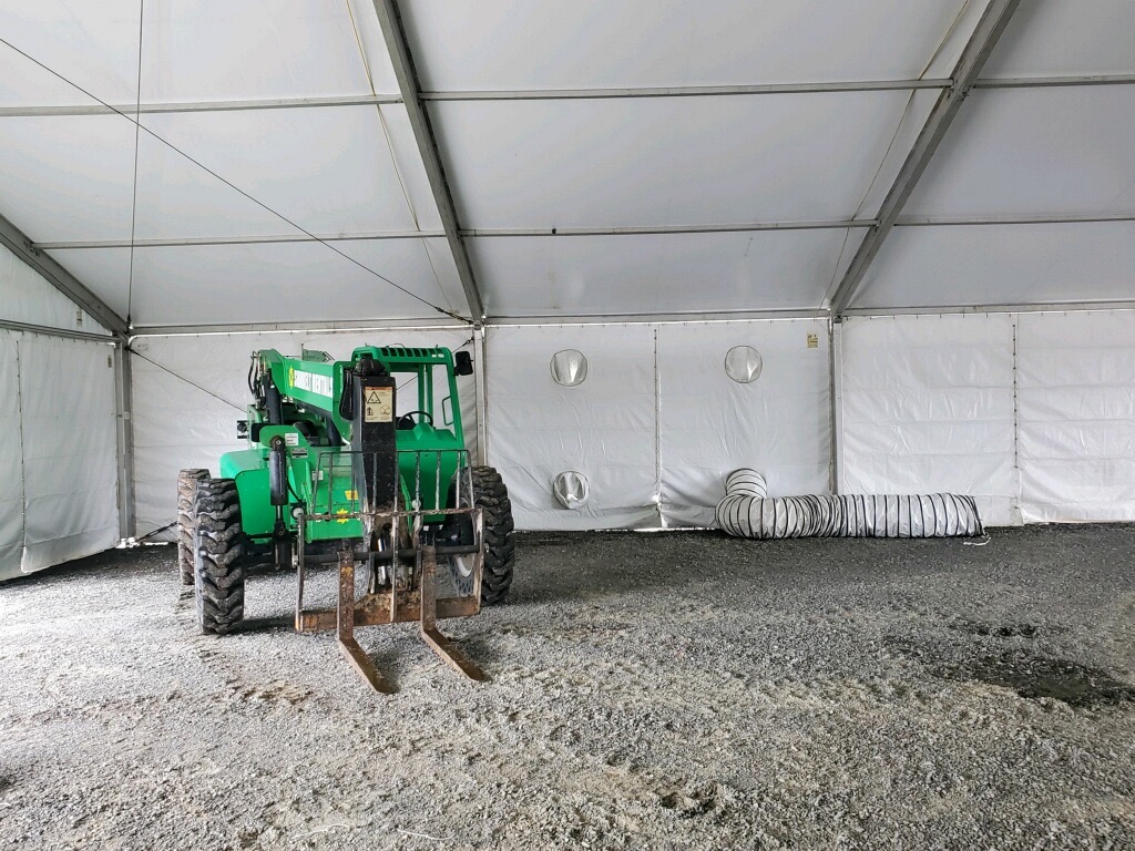 Machinery in Temporary Warehouse Tent - American Pavilion
