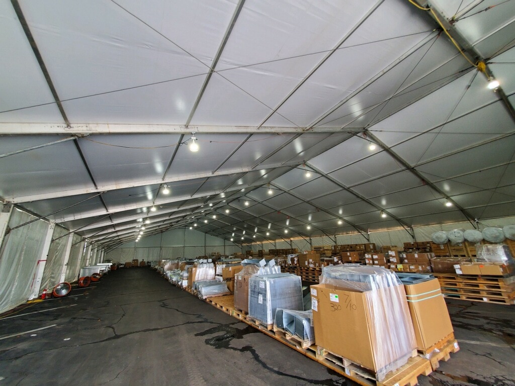 Storing Machinery and Materials In Tent - American Pavilion