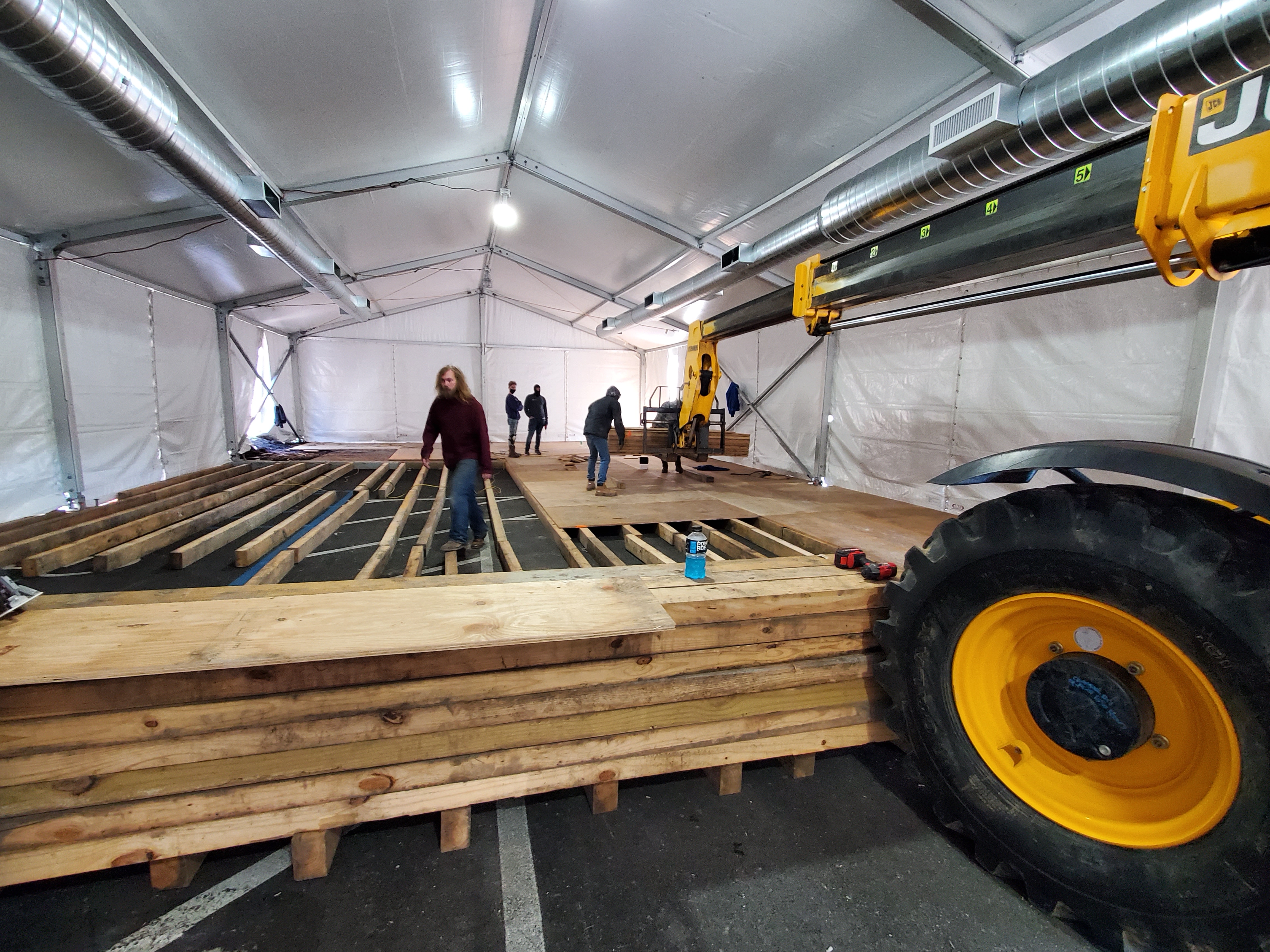 Installing Raised Plywood Flooring - American Pavilion
