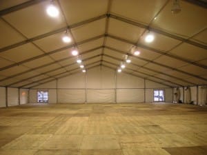 large clear span tent with floor installed as sleeping tents for huricane first responders     
